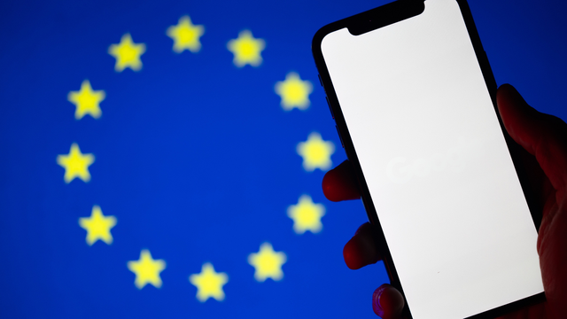 European Union (EU) flag and phone.
