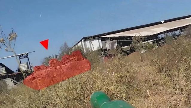Footage shows Al-Qassam Brigades targeting an Israeli Achzarit armored personnel carrier with a "Yassin 105 shell in the Gaza Strip (Military Media)