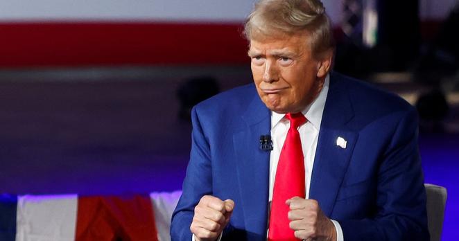 Republican presidential nominee and former U.S. President Donald Trump gestures as he attends a Fox News town hall hosted by Sean Hannity in Harrisburg, Pennsylvania, U.S. September 4, 2024.  REUTERS/Evelyn Hockstein