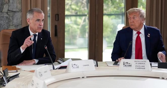 U.S. President Donald Trump, right, and Canada's Prime Minister Mark Carney participate in a session of the G7 Summit, Monday, June 16, 2025, in Kananaskis, Canada. (AP Photo/Mark Schiefelbein)