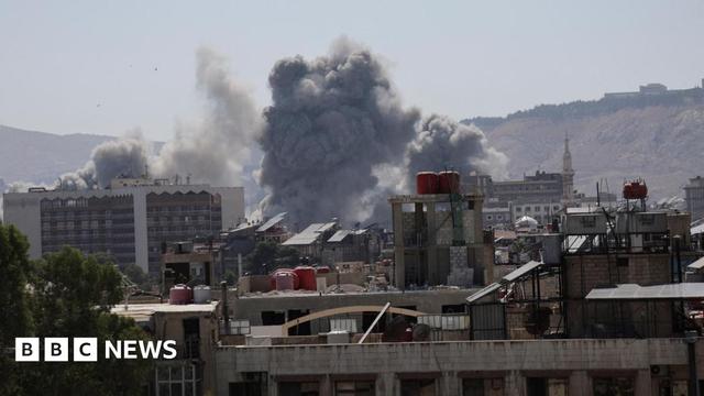 Smoke rises after an Israeli strike on Syria's defence ministry headquarters in Damascus, Syria (16 July 2025)