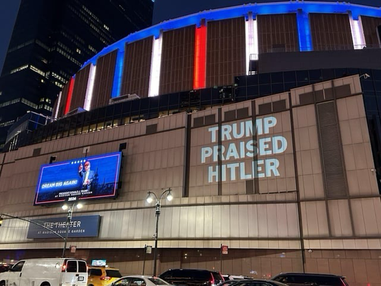 Light projection on Madison Square Garden where a Trump rally is being held tonight. Projection reads “Trump Praised Hitler”