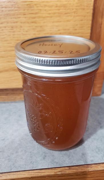 A 16 ounce jar of honey.