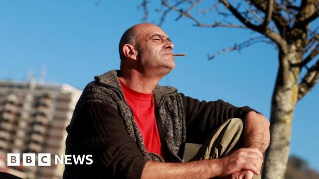 Man enjoying a cigarette in Bilbao