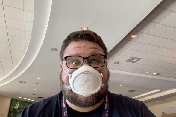 Selfie of yours truly, wearing a FloMask, sitting in the Long Beach Convention Center lobby, making a silly “surprised” face