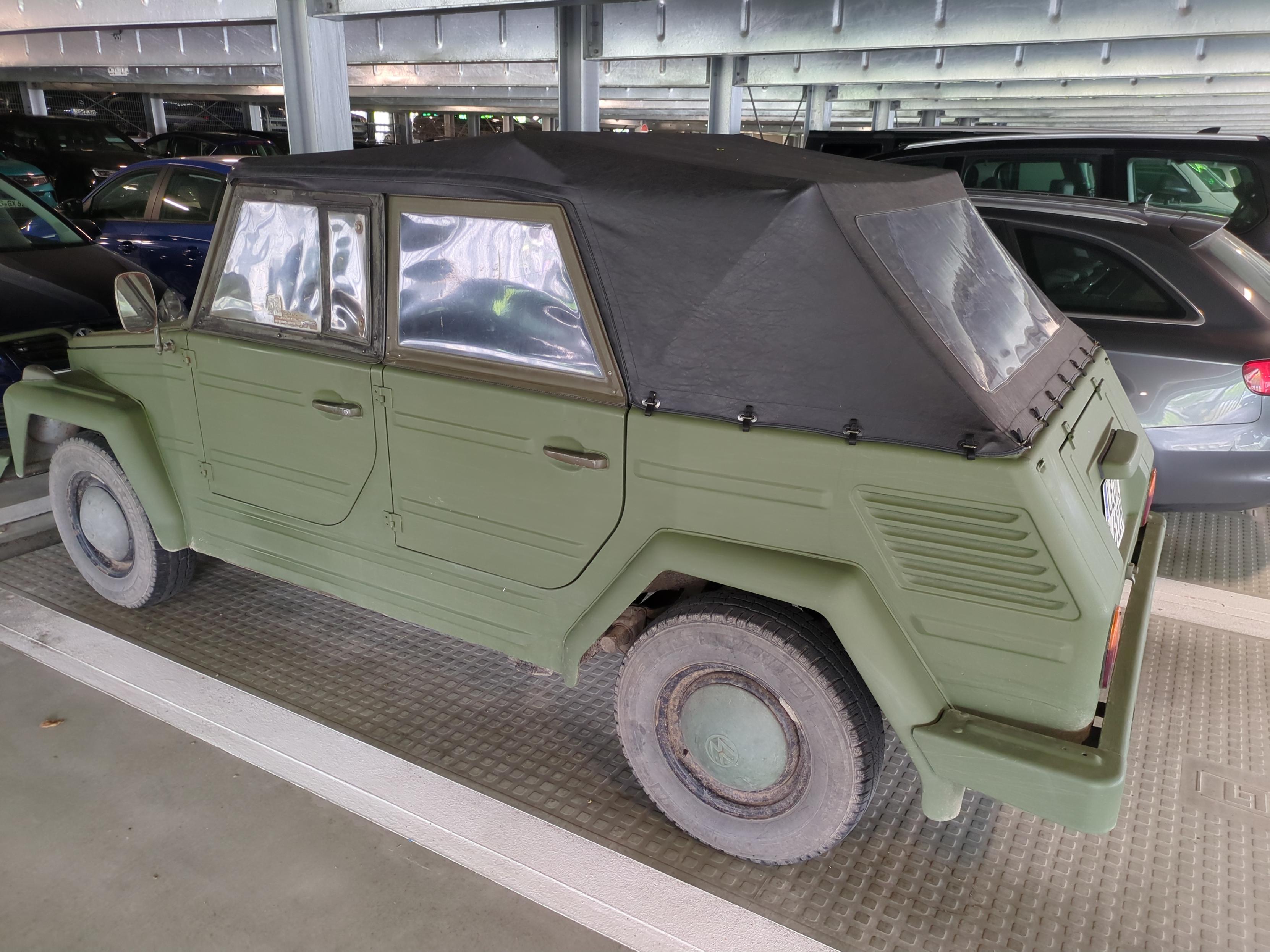 Volkswagen 181 aka "The Thing"
In tarnish olive. It looks like an old VW Beetle, but box-ish, like re-built in Minecraft.