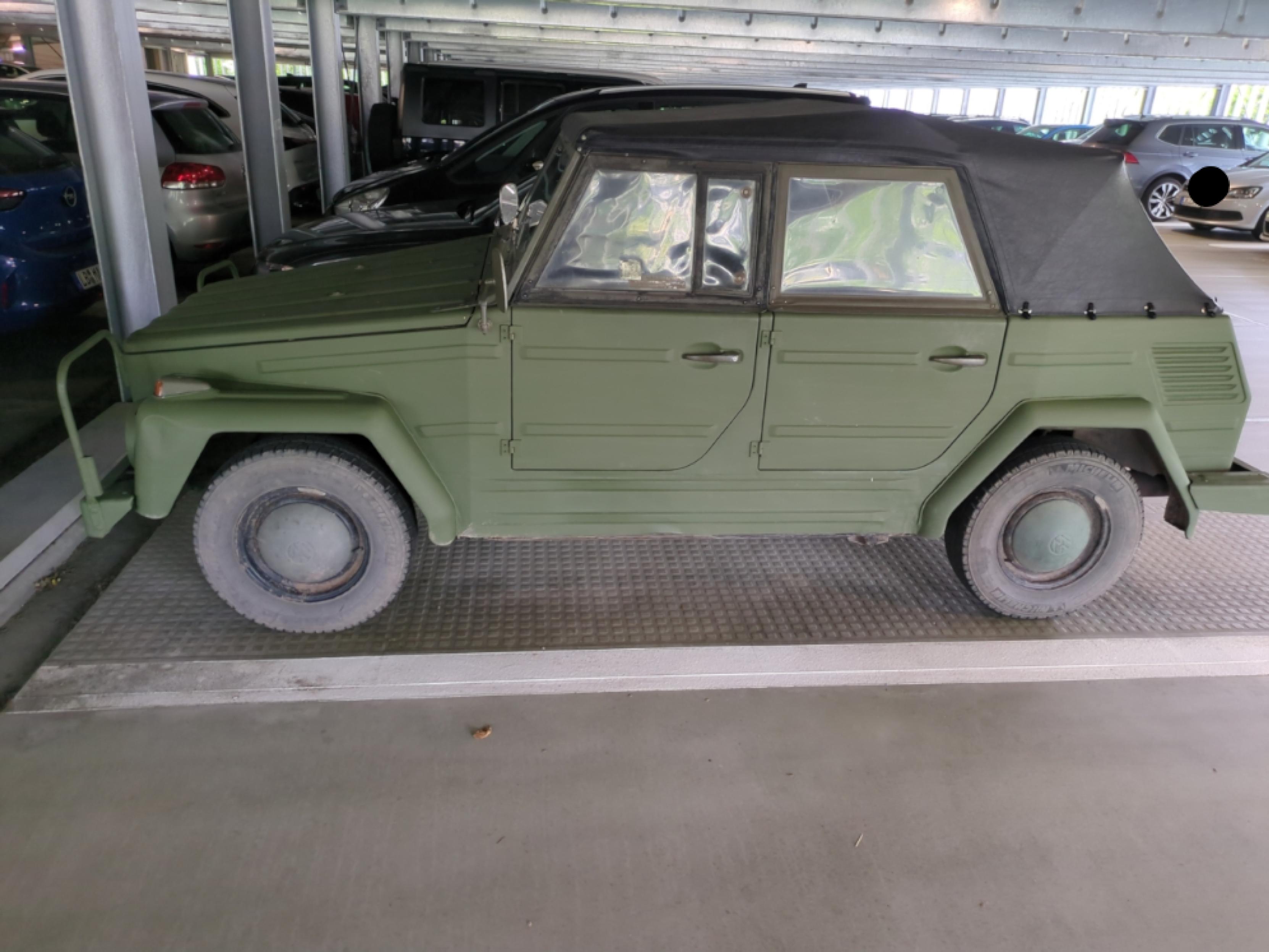 Volkswagen 181 aka "The Thing"
In tarnish olive. It looks like an old VW Beetle, but box-ish, like re-built in Minecraft.