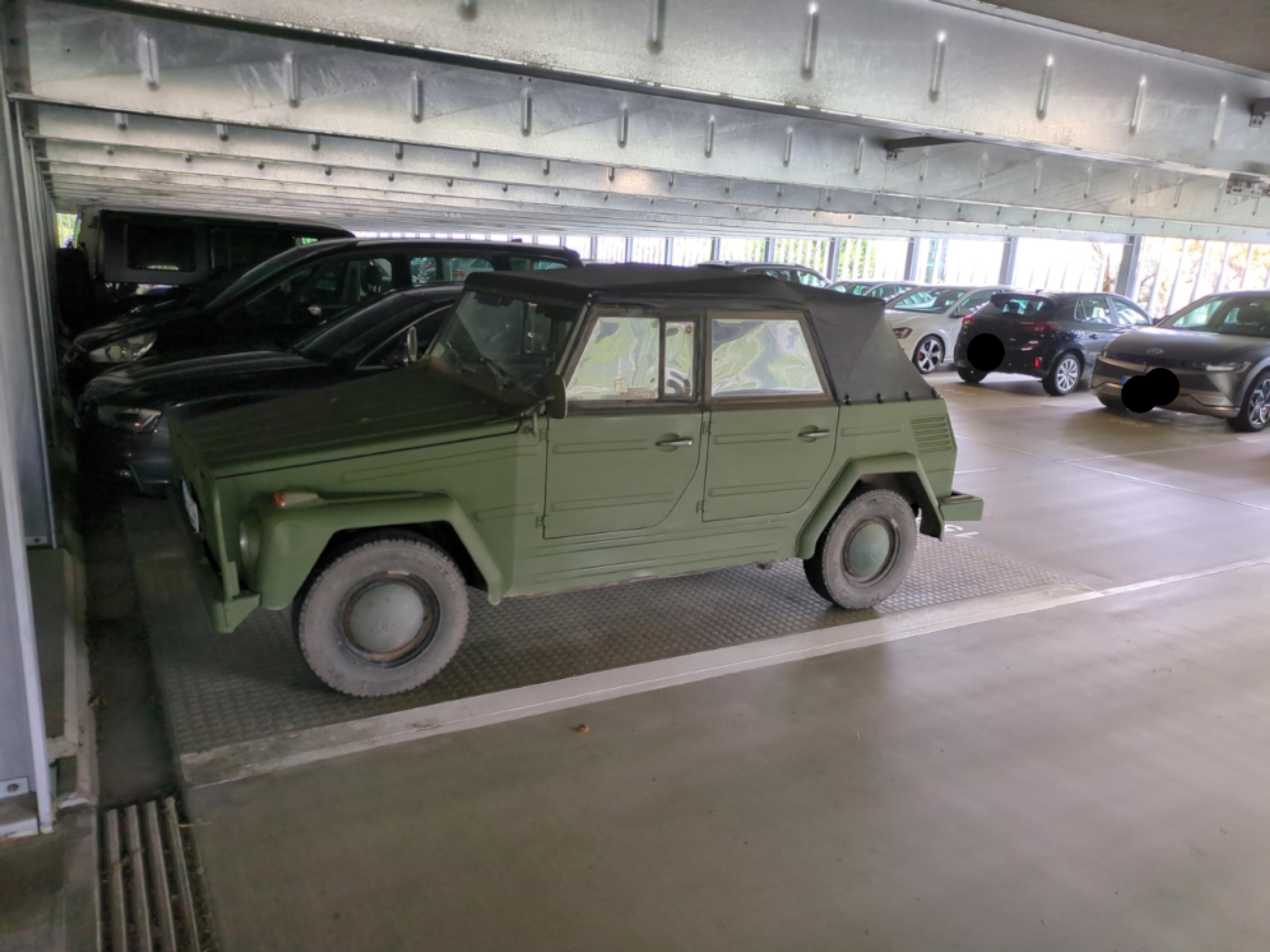 Volkswagen 181 aka "The Thing"
In tarnish olive. It looks like an old VW Beetle, but box-ish, like re-built in Minecraft.