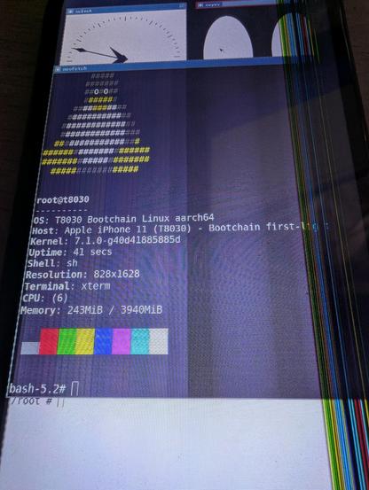 X11, xclock, xeys and xterm running in Linux on an iPhone 11