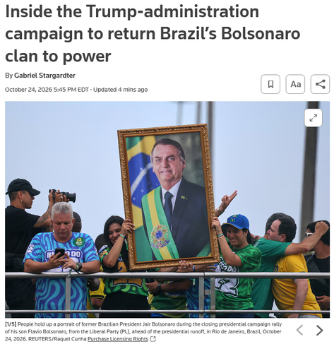 Image of the top of the article.

With pic - People hold up a portrait of former Brazilian President Jair Bolsonaro during the closing presidential campaign rally of his son Flavio Bolsonaro, from the Liberal Party (PL), ahead of the presidential runoff, in Rio de Janeiro, Brazil, October 24, 2026. REUTERS/Raquel Cunha