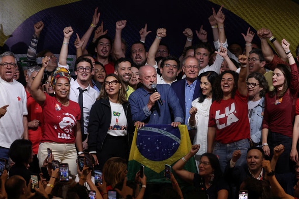Lula with supporters
Credit...Amanda Perobelli/Reuters