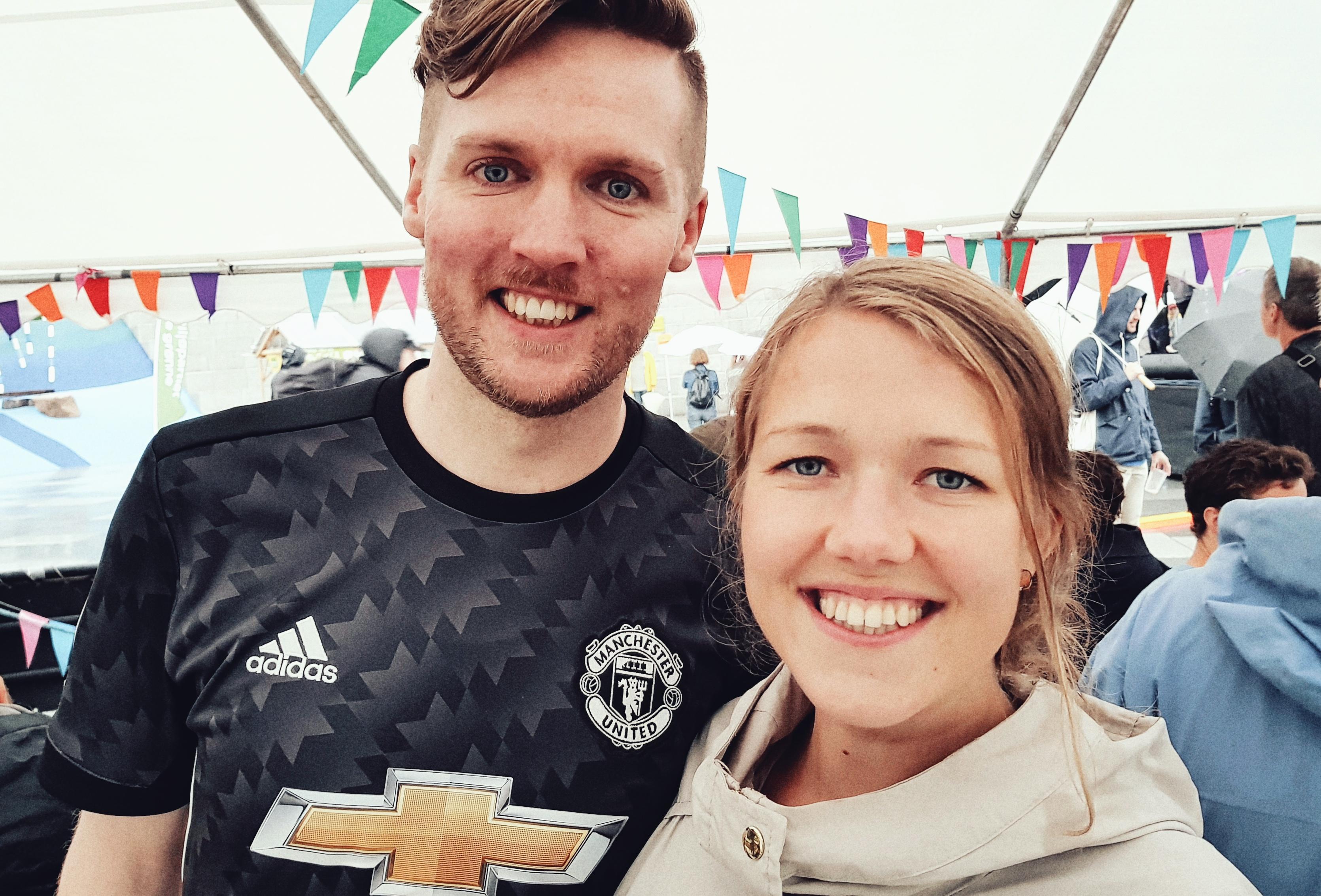 A photo of a youthful Matt and Une Bastholm in a large tent.