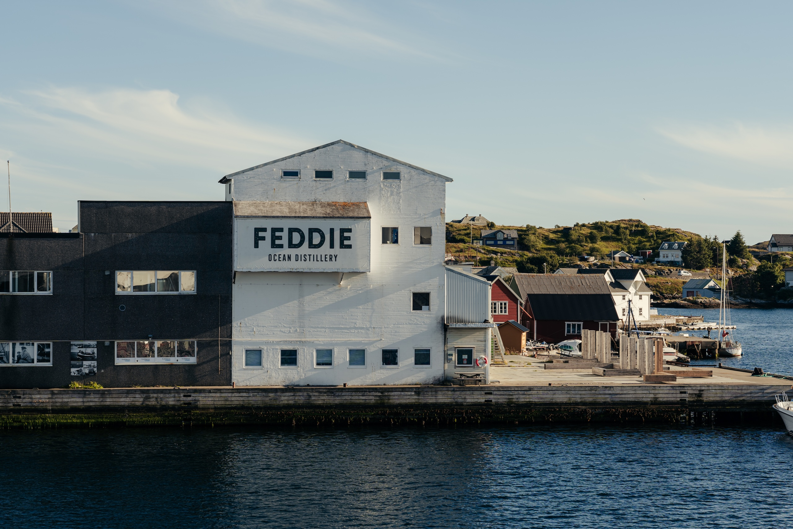 A photo of the FEDDIE distillery, situated on a harbour / dockland area.
