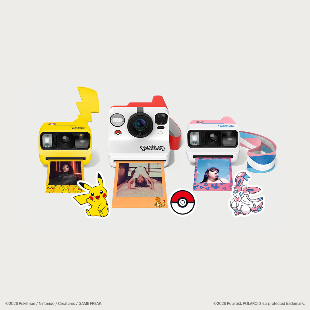 All three cameras ejecting film photos which contain a colourful patterned border.