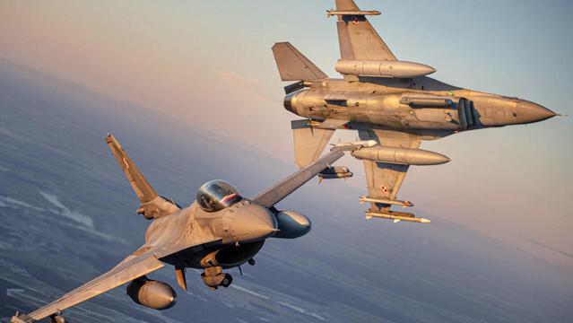 Polish Air Force F-16 fighter jets participating in NATO's Baltic Air Policing Mission operate in Lithuanian airspace, on 25 January 2022. | Photo: AP