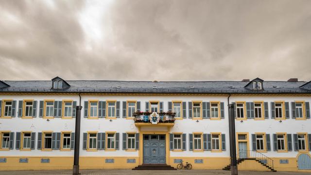 Frontal shot of an official building.