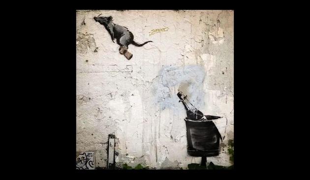 Abbildung könnte Graffiti von Banksy sein. Ratte, links oben, reitet wie Baron Münchhausen auf einem Champagnerkorken, abgeschossen aus der Flasche rechts unten.
Symbolisiert sehr schön das ekelhafte Verhalten der gegen die Menschenwürde Handelnden.