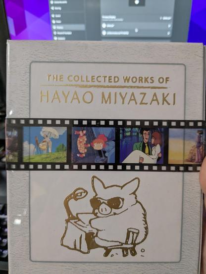 A photo of me holding the box for the collection.