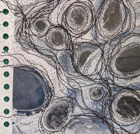 sketchbook page with free machine stitch on paper collage. Black, white and greys, circular shapes and surrounding lines.