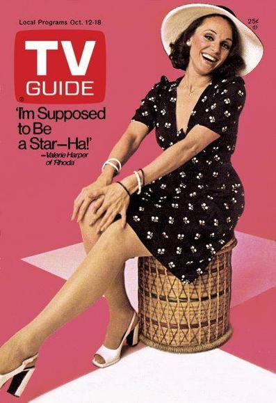 Valarie Harper is on the cover promoting her show Rhoda. Sh is a black sun dress with a floppy white bonnet