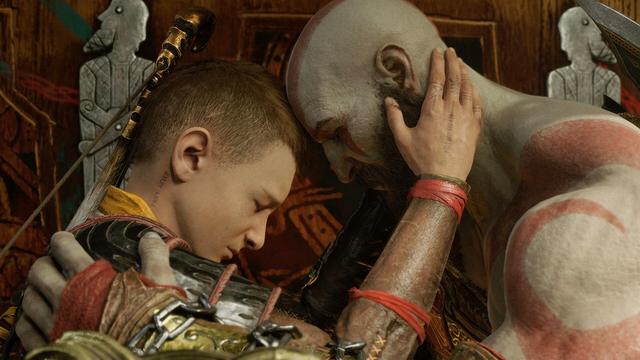 A screenshot of God of War Ragnarok. Kratos and Atreus are standing in front of a prophecy board holding each other with their foreheads touching.