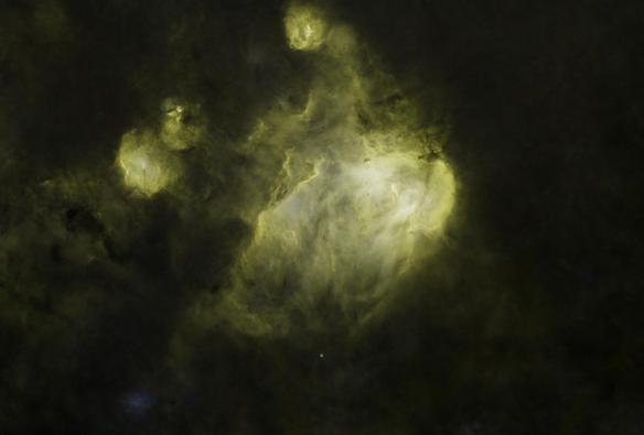 The same nebula, but with all stars removed. This makes the small dark dusty cocoons much easier to see.