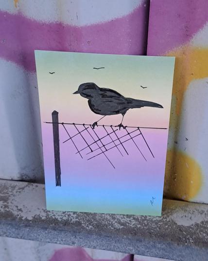 Silhouette drawing of sparrow on wire fence, placed to bus stop.
