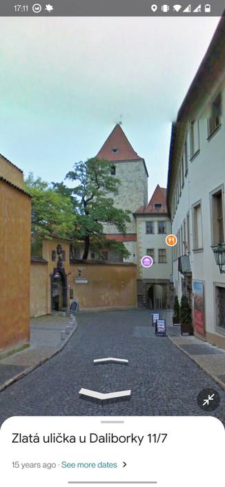 Screenshot from Google maps streetview showing more or less the same scene as in the photo but about a century later.