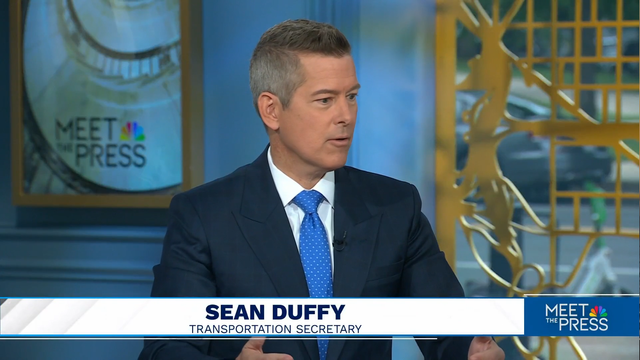 Screenshot of Sean Duffy, Transportation Secretary, on Meet the Press. He is wearing a dark suit, white shirt, and blue tie with small white dots.