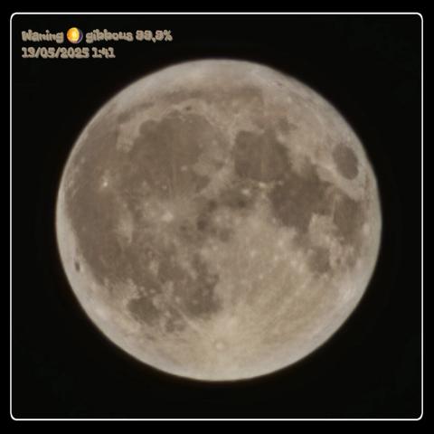 The image shows a close-up view of the moon against a black background. The moon is nearly full, with a visible waning gibbous phase, as indicated by the text in the image. The surface of the moon is detailed, displaying various craters and maria, which are dark, basaltic plains formed by ancient volcanic eruptions. The moon's surface appears textured and rugged, with shades of gray and brown. The text in the image reads "Waning 🌖 gibbous 99.9% 13/05/2025 1:41," providing information about the moon's phase, percentage, date, and time. The moon is centered in the image, with a clear and sharp appearance, highlighting its features.

Provided by @altbot, generated privately and locally using Ovis2-8B

🌱 Energy used: 0.173 Wh