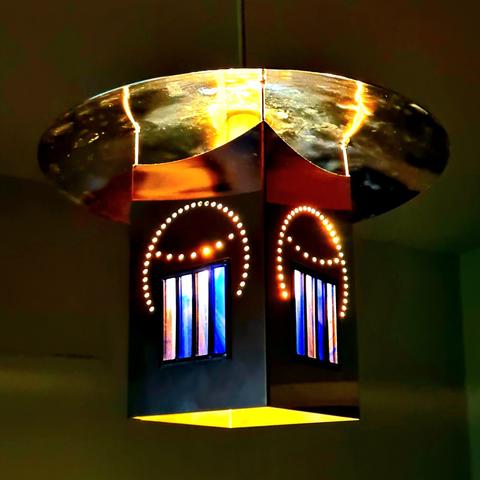 An Art Nouveau style Charles Rennie Mackintosh lamp dating from ariubd 1900.
