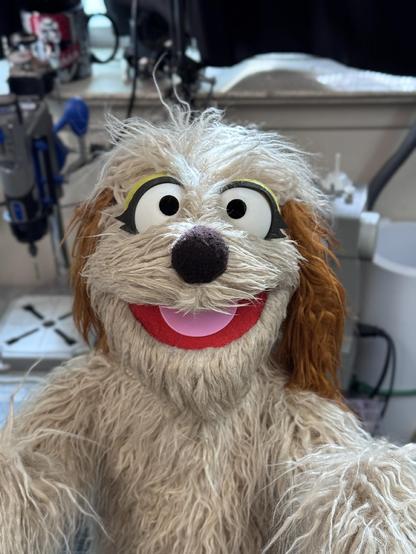 Beige dog hand puppet front closeup view