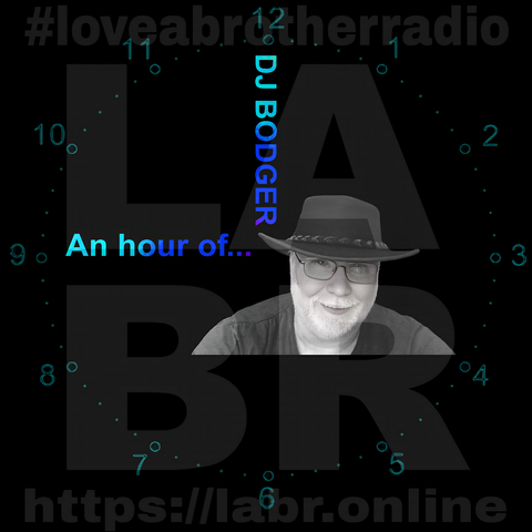 Black Background. LABR Logo in deep dark grey. #lloveabrotherradio on top. https://labr.online on the bottom. A army green colored clock with numbers and dots covering the entire image. The hand set at 9 o'clock is the short hand and the hand is made out of the name of the show. "And hour of..." The min. hand set at the 12 and is made out of his name. DJ Bodger. A black & white picture of DJ Bodger. White British male with glasses, wearing an Aussie. cowboy hat. Grey manicured beard. Black t-shirt