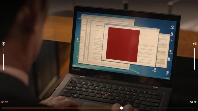 Nahaufnahme des Notebooks, es ist ein fiktives Betriebssystem zu sehen, das stark an Windows 7 und 8 erinnert