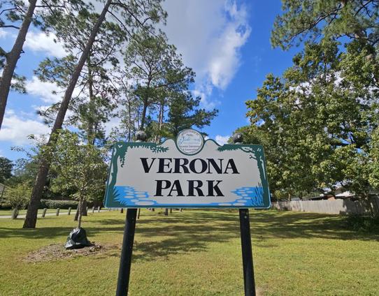 A small neighborhood park, marked by a city park sign: Verona Park