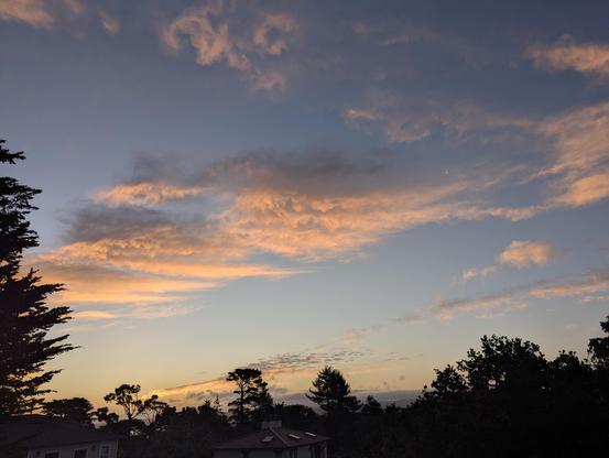 The clouds over Monterey lighting up in pastel colors