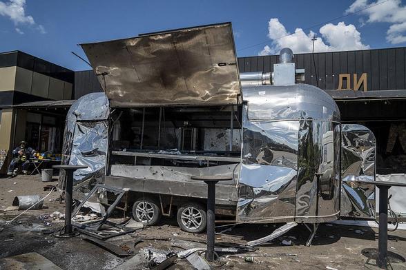 A view of destruction after Lancet drone strikes at a roadside cafe in Raihorodka, Lyman District, Donetsk Oblast oin May 2025. A 39-year-old resident who was selling at the market was injured and taken to hospital with a mine blast injury and shrapnel wounds while a 51-year-old kiosk vendor was killed