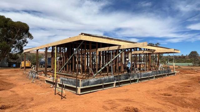 Outback Climate Smart Home under construction with just the old frame and roof remaining.