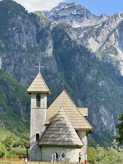 Catholic church with mountain backdrop