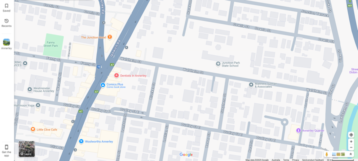 Google Maps screenshot of urban area in the default style. Buildings are visible, main roads, a handful of shops, bus stops.