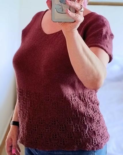 Same woman, same shirt, same situation, but this time from half profile.