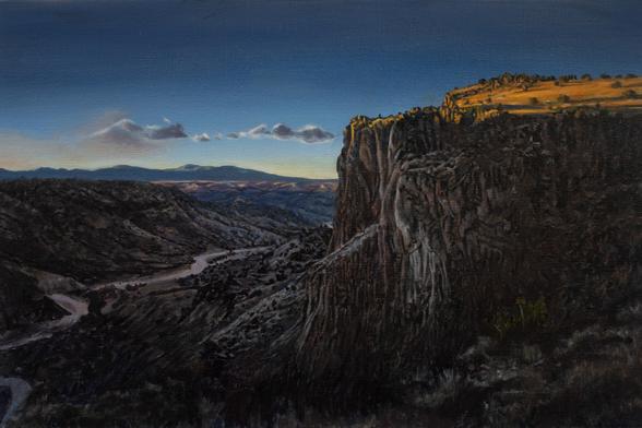 work in progress oil painting of a volcanic rock formation in new mexico at sunset
