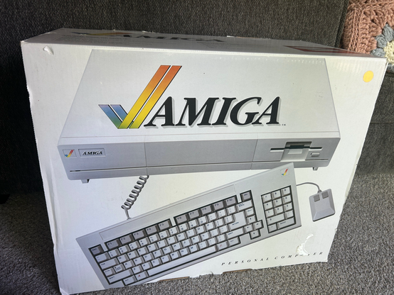 Photo of an in box Amiga 1000 PC.