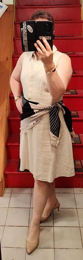 Off white linen shirt dress, black and white Albers scarf tied around the middle. Beige slingbacks, gold jewelry. Yeah I need to iron.