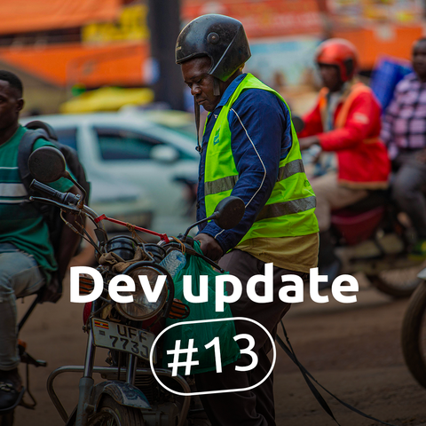 Image illustrating Jami's Development Update #13. In the foreground, a motorcycle taxi driver wearing a high-visibility vest looks at his phone, surrounded by other riders and pedestrians on a busy street. The Jami logo with the text 'a GNU package' appears in the top right. A 'Dev update' badge and the text 'Dev update #13' are overlaid on the image.