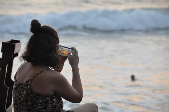 Ivonne taking pictures of the Las Penitas Sunset