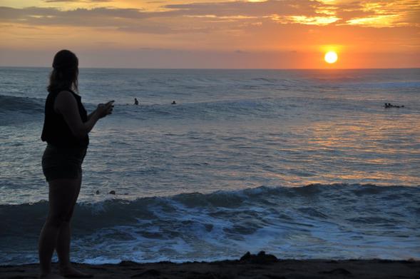 Ivonne silhouette in the sunset light on Playa Las Penitas