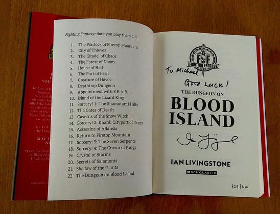 Inside title page of "The Dungeon on Blood Island", numbered 329/400 and signed by author Ian Livingstone, with the inscription, "To Michael, Good Luck!"