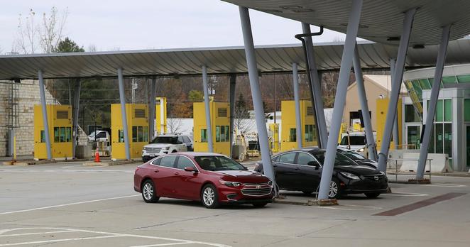 Vehicles are parked at the U.S. border post at Highgate Springs, Vt., Monday, Nov. 8, 2021. (AP Photo/Wilson Ring)