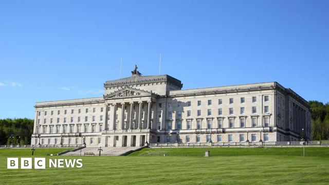 The Parliament Building at Stormont, with a blue sky in the background. 
